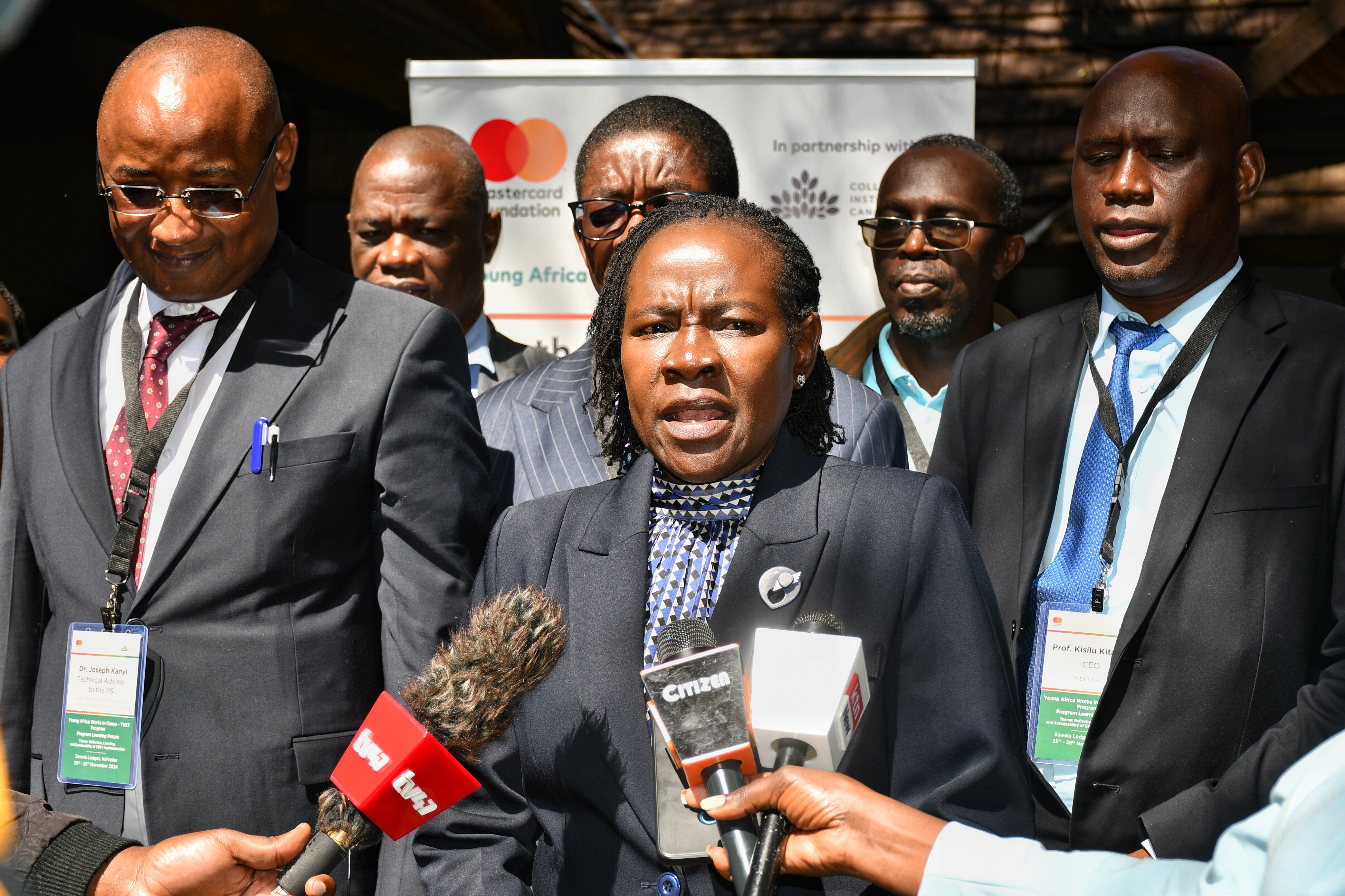 rincipal Secretary, State Department for Technical, Vocational and Education Training (TVETS) Dr Esther Muoria (centre) with other education stakeholders addresses education stakeholders in Naivasha.