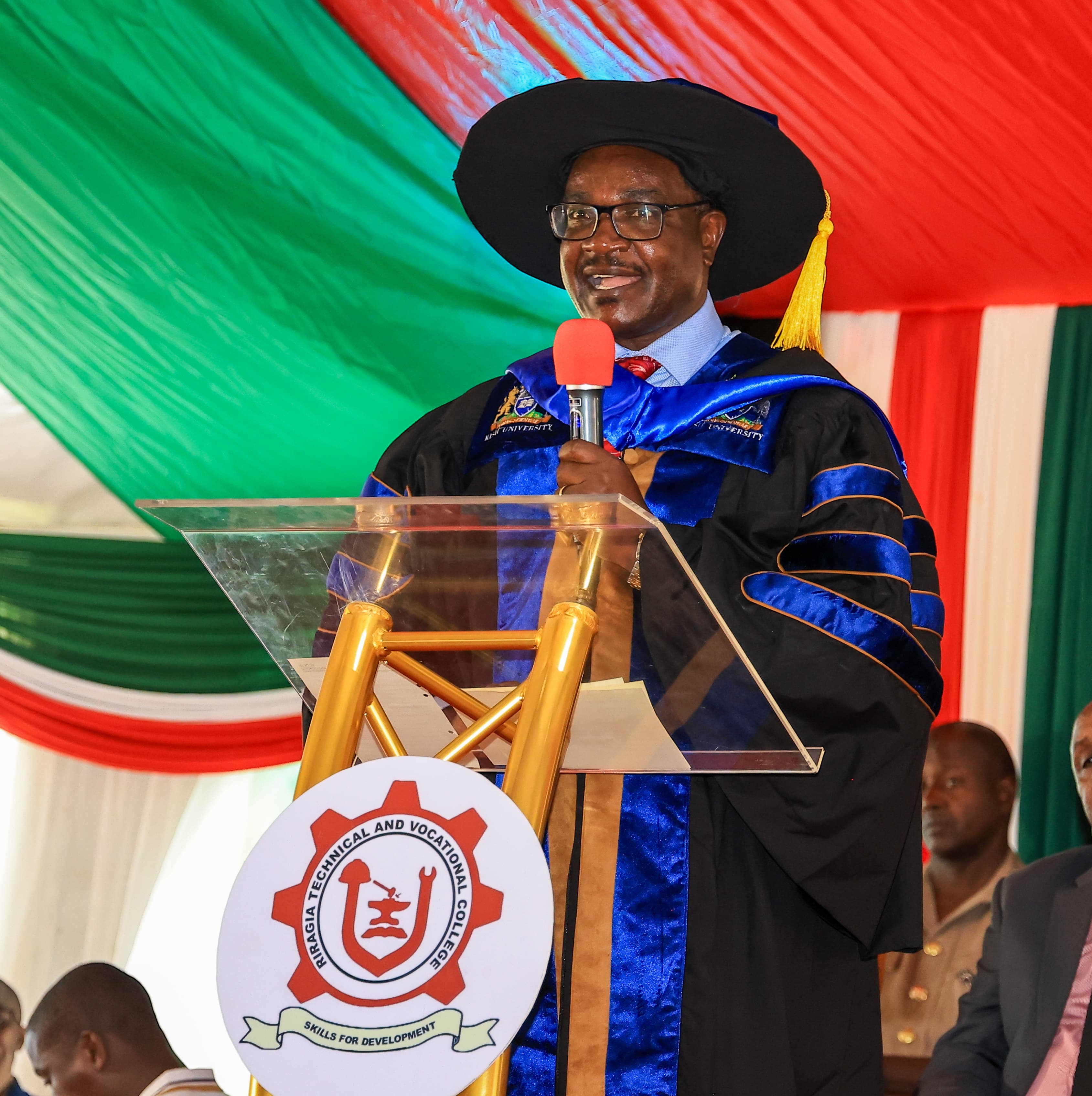 Education Cabinet Secretary Julius Ogamba speaking during the inaugural graduation ceremony at Riragia Technical and Vocational College (TVC) in Marani Sub County, Kisii County