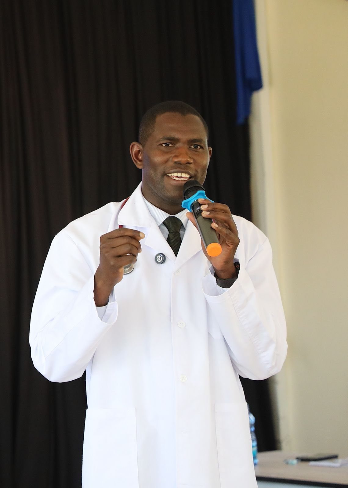 Medical Services PS Dr. Ouma Oluga speaking during the 2nd Artificial Intelligence in Health Workshop held at Kenyatta National Hospital to mark World Cancer Day.
