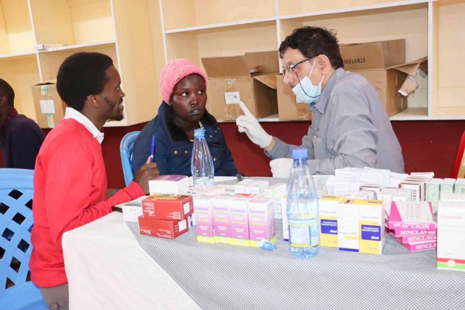 An ENT specialist reviews a throat patient during the ENT medical camp at Michuki national polytechnic, Kangema constituency, Murang’a county. Photos by Florence Kinyua.