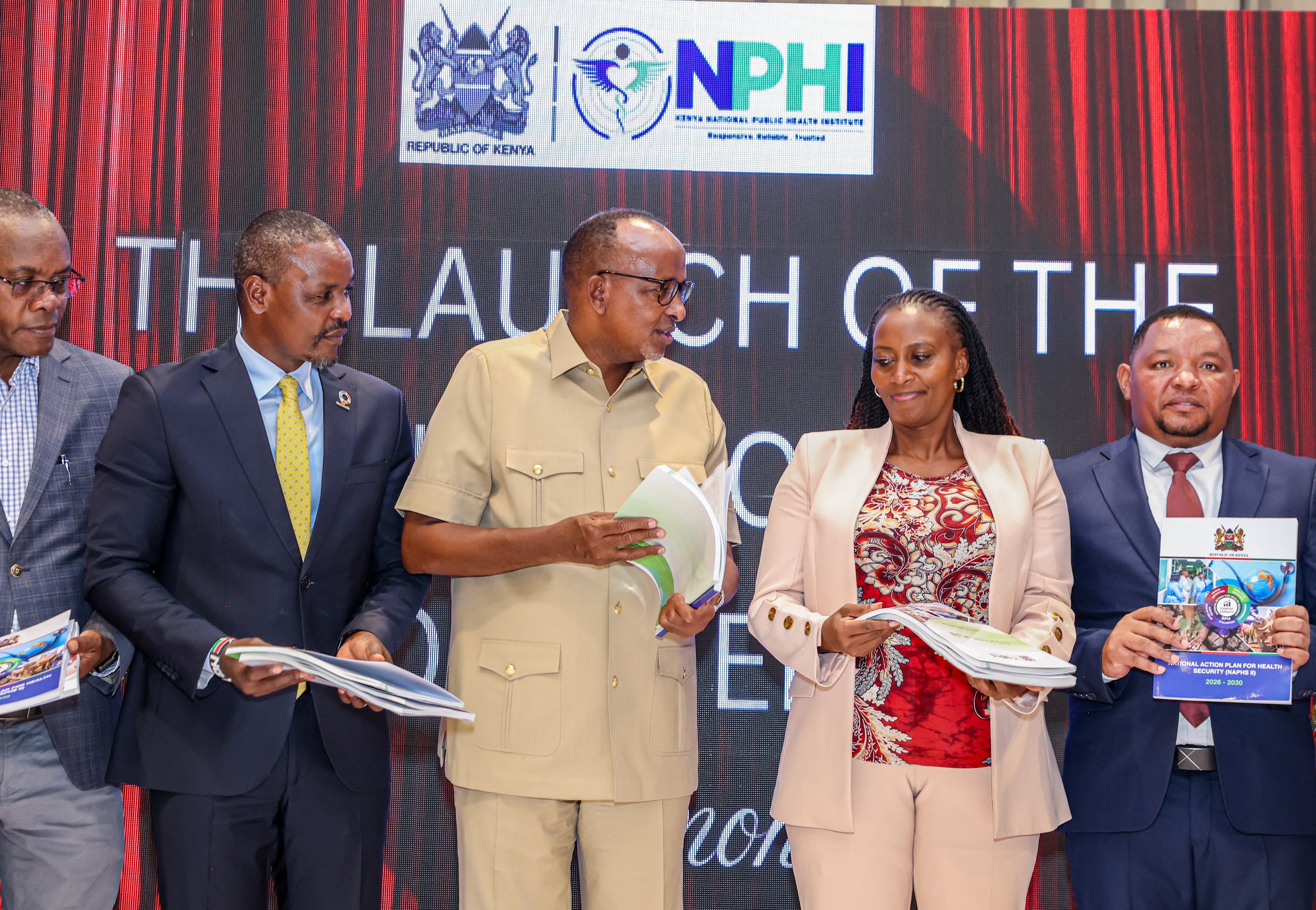 Mary Muthoni, Principal Secretary for Public Health and Professional Standards; Festus K. Ng’eno, Principal Secretary for Environment and Climate Change; Neema Rusibamayila Kimambo, WHO Acting Country Representative; John Kariuki, Chairperson of the Kenya National Public Health Institute Board; Kamene Kimenye, Acting Director-General of the Kenya National Public Health Institute; alongside representatives from Africa CDC, development partners, and stakeholders from national and county governments.
