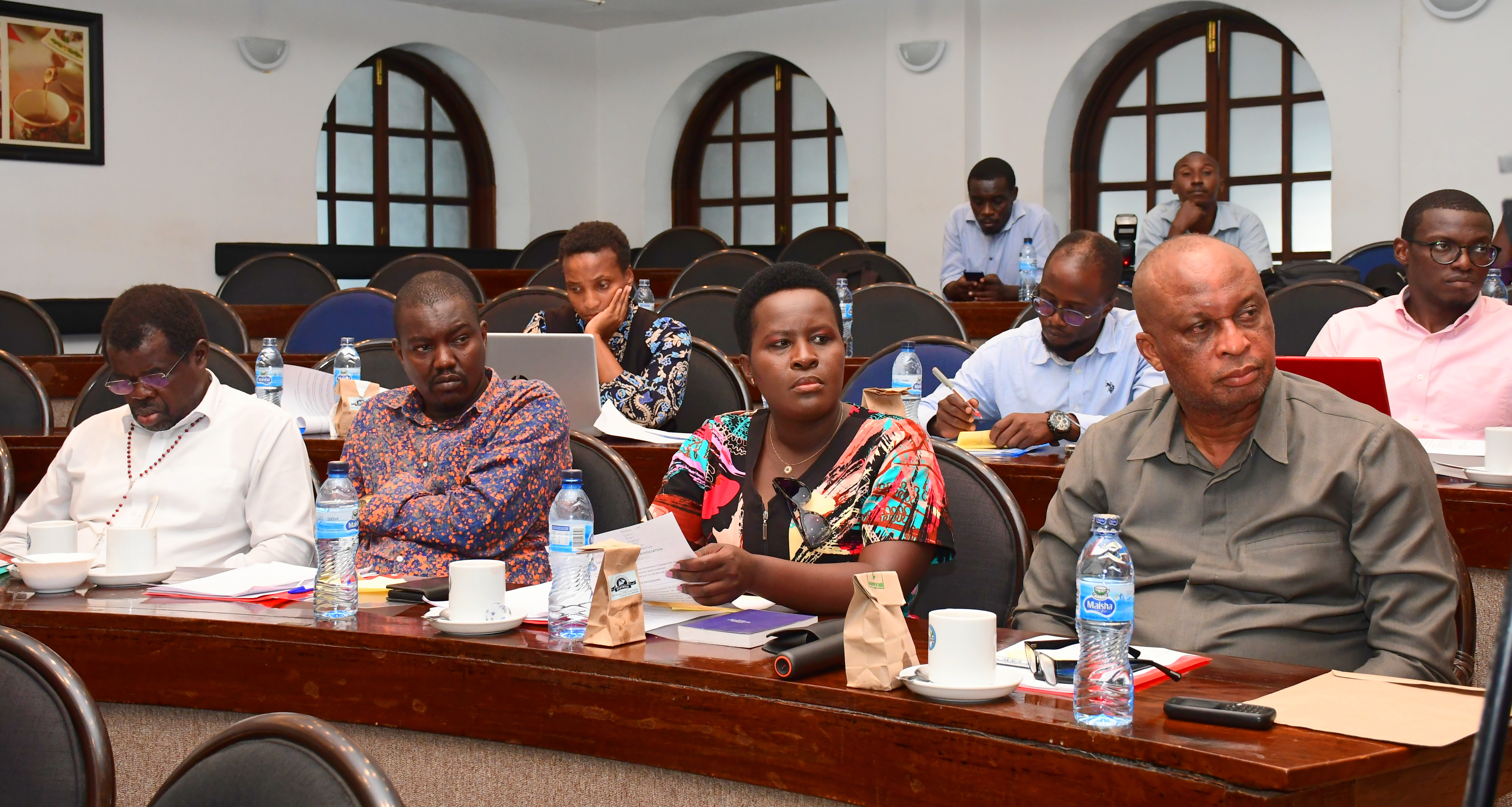 A section of the Senate Standing Committee members on Trade, Industrialization and  Tourism members sample tea at the Mombasa tea auction.  Photo/Andrew Hinga.