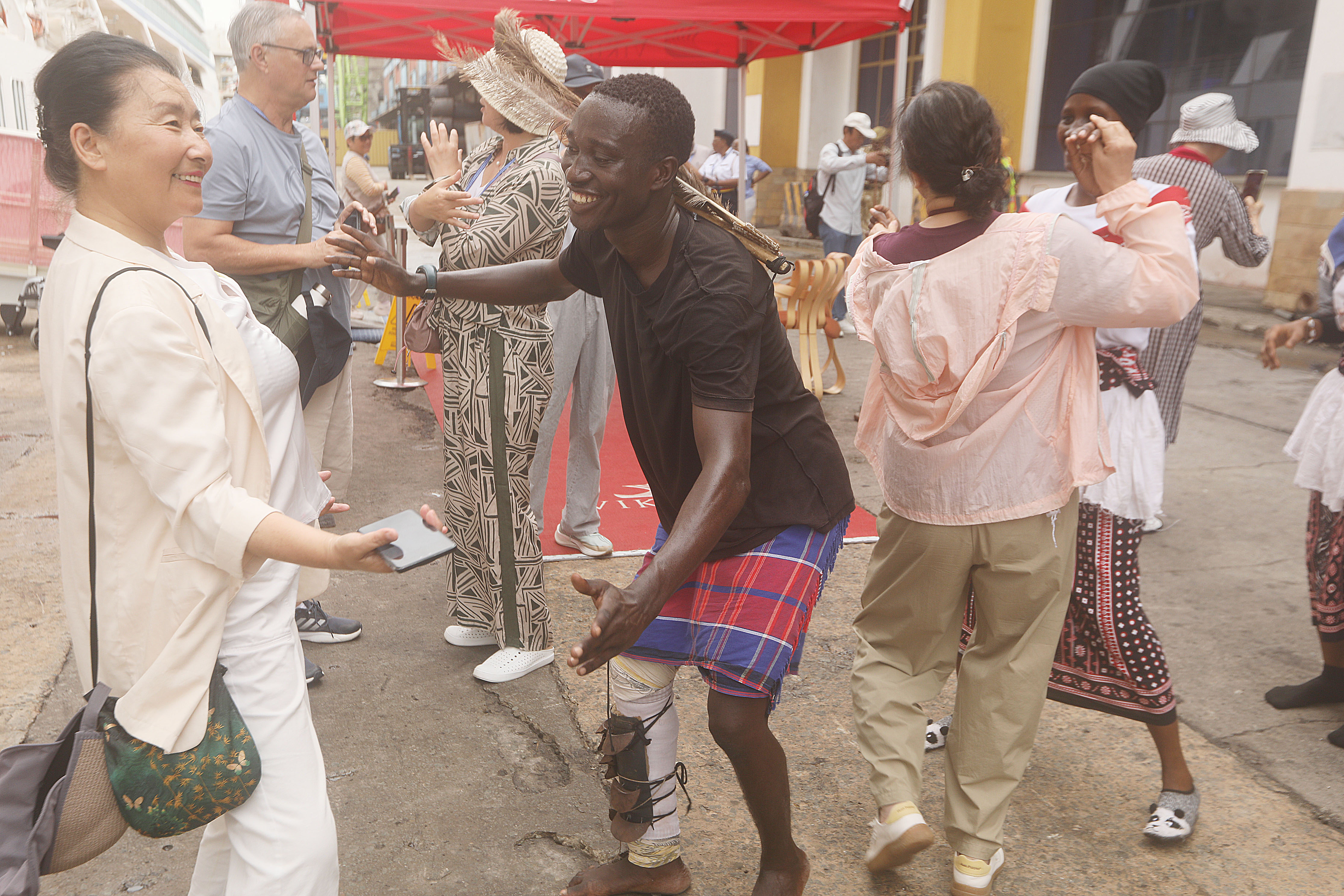 Some of the tourists who arrived at the Port of Mombasa aboard MS Viking Yi Dun enjoy Mijikenda traditional dances.
