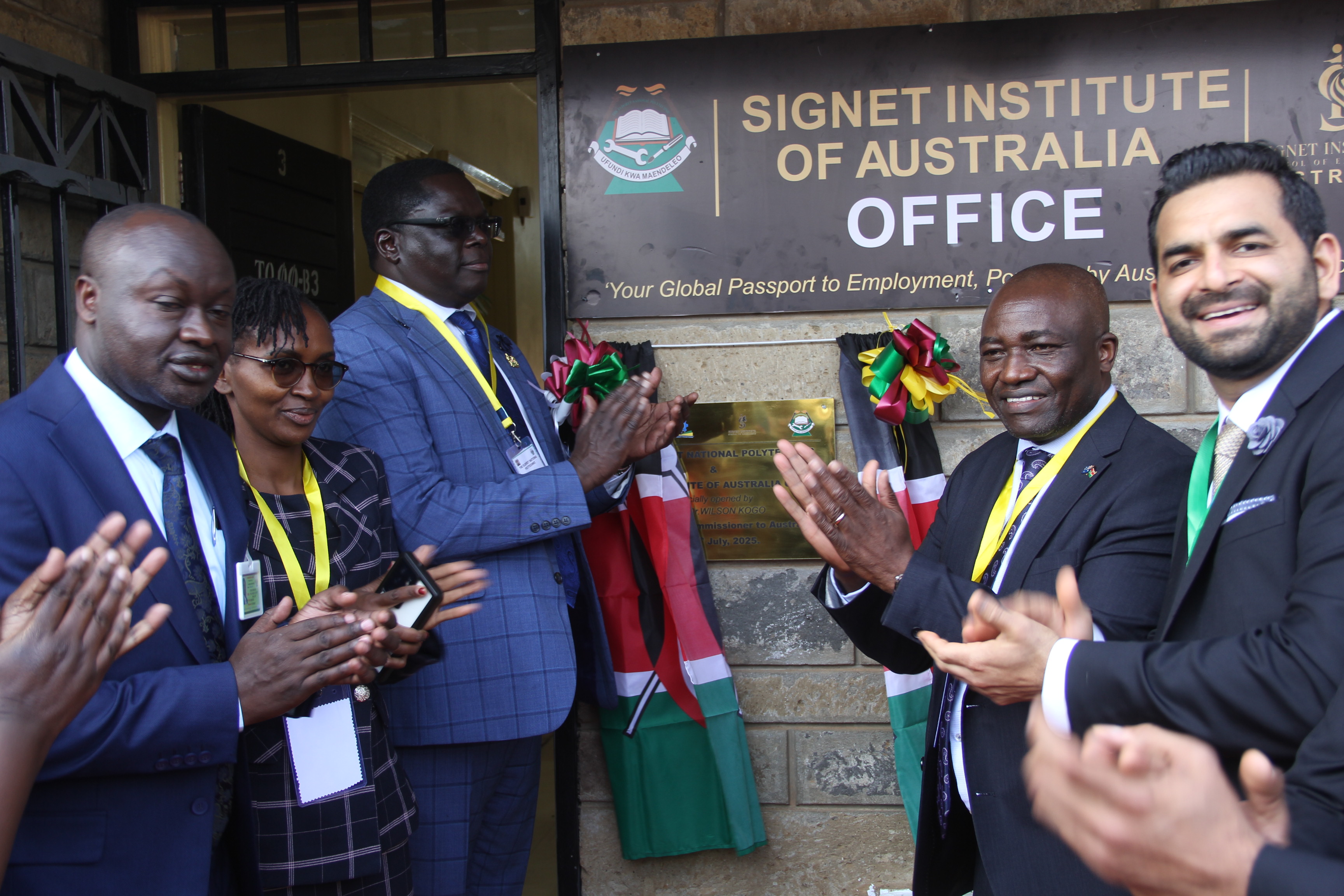 The Kenya High Commissioner to Australia Dr. Wilson Kogo (3rd left), TVET Director John Tuwei (2nd left), Signet Institute Sales and marketing Head Muhammad Ali (right) officially launched the Signet Institute of Australia office in Eldoret National Polytechnic, Eldoret, Uasin Gishu County. PHOTO/ EKUWAM SYLVESTER