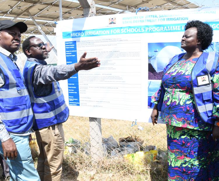 Thande Githae (2nd left), the Director of Climate Resilience for Food and Water Security, explains components of the Raongo Micro Irrigation project to the Secretary of Administration, State Department for Irrigation, David Yatich Kipkemei, and Homa Bay County Women’s Representative Dr Joyce Atieno ‘Bensuda’ (R).