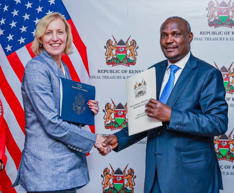 Cabinet Secretary for the National Treasury and Economic Planning John Mbadi (right) and U.S. Chargé d’Affaires Susan Burns during the signing of the Strategic Objective Agreement (SOAG) for Health at the National Treasury Headquarters in Nairobi. Photo/