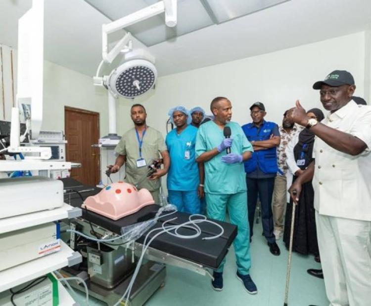 President Willam Ruto (R) inspecting a modern operating theatre under the National Equipment Service Programme.